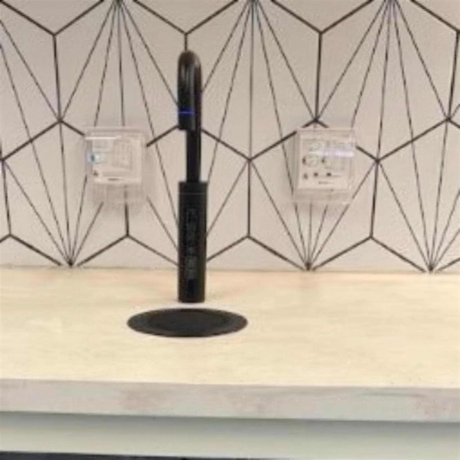 Mains-fed tap on a worktop in an office kitchen